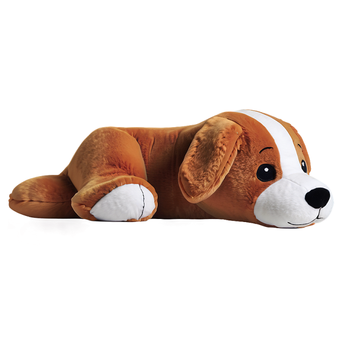 a stuffed dog laying down on a white surface