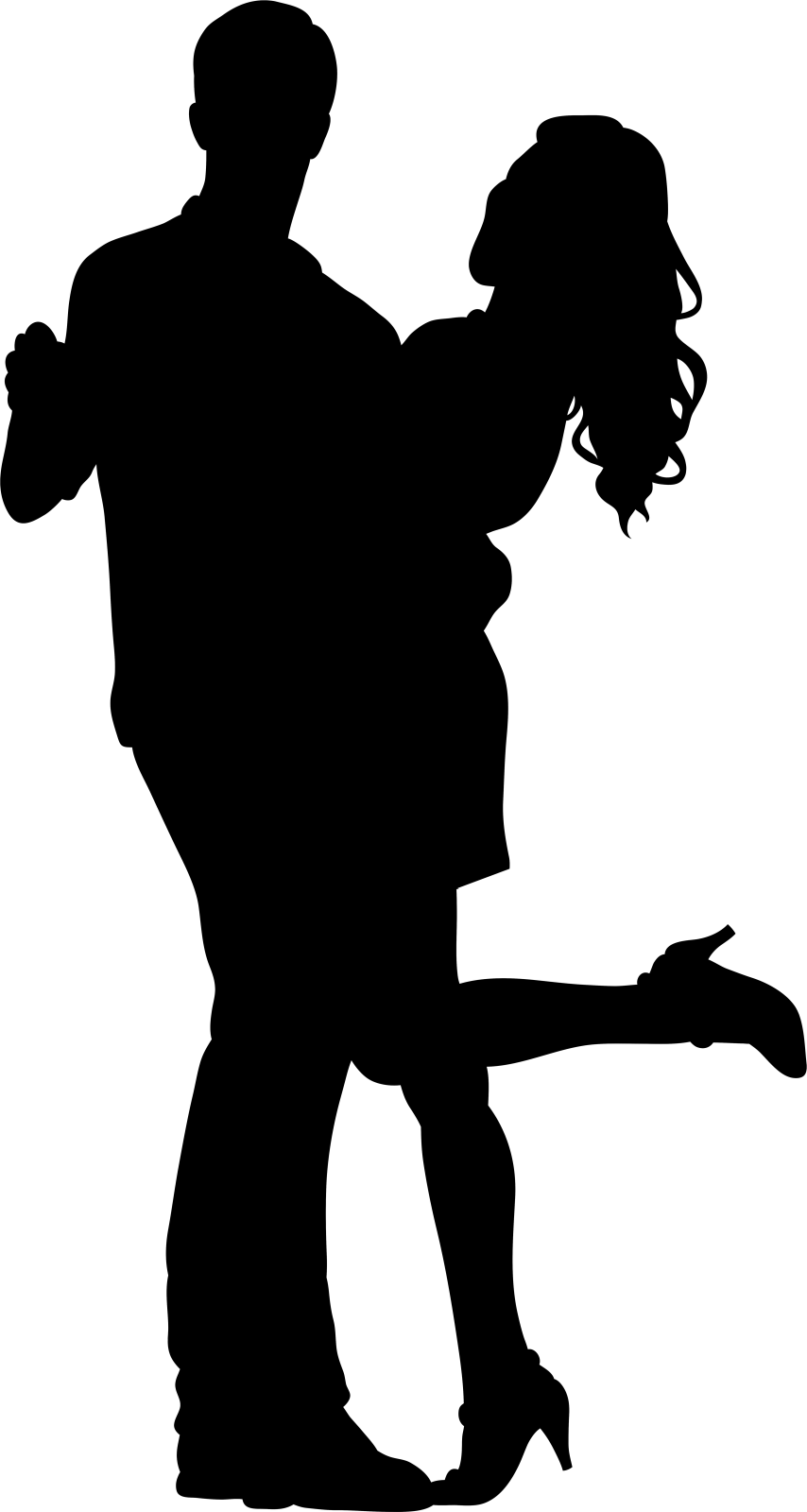 a silhouette of a man and woman dancing