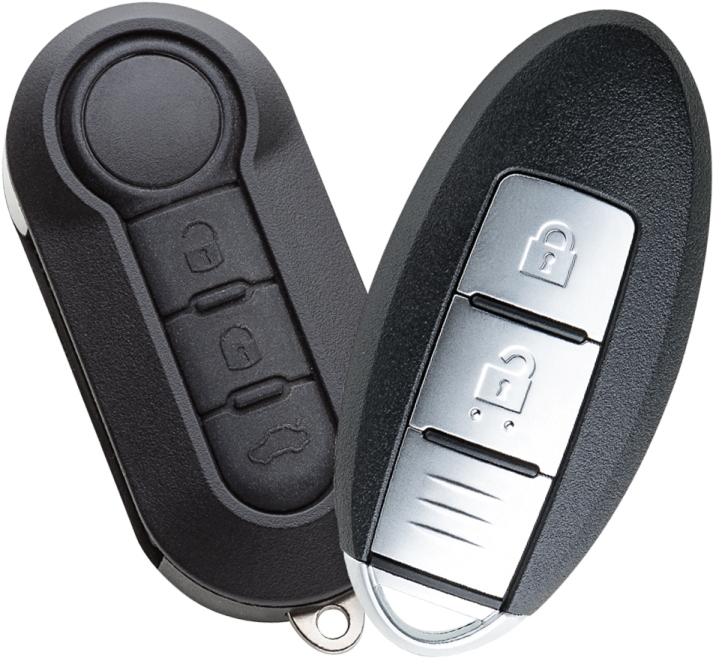 a pair of car keys on a white background