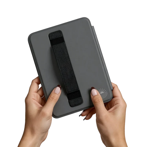 a woman's hands holding an ipad case