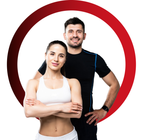 a man and woman standing in front of a red circle