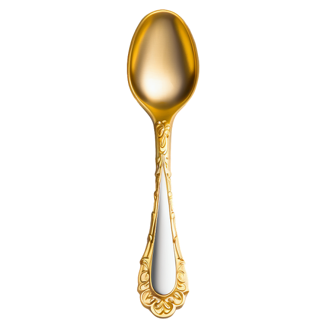 a gold spoon with an ornate design on it