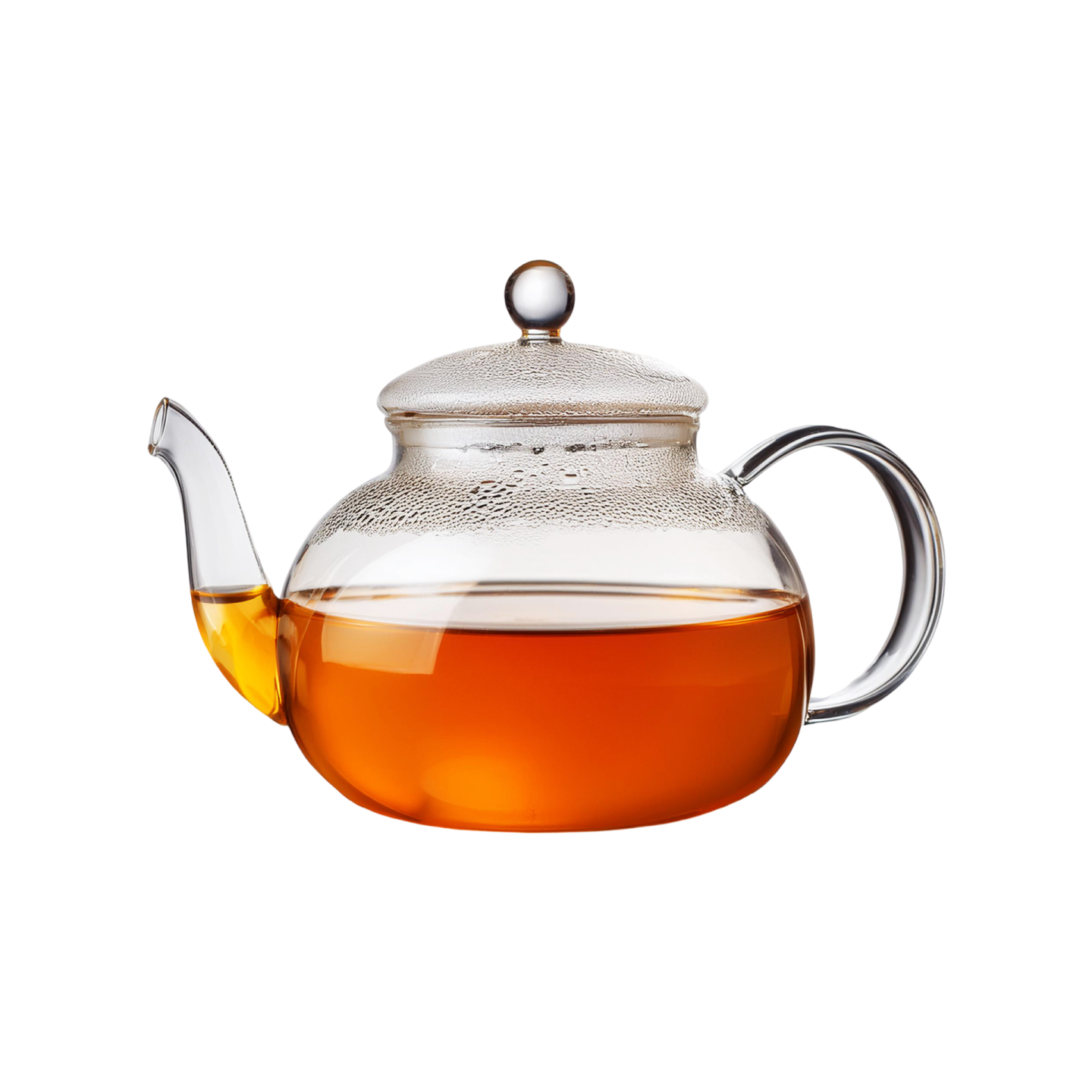 a glass tea pot filled with green tea