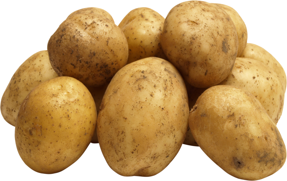 a pile of potatoes on a white background