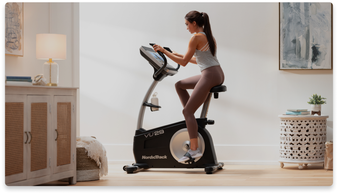 a woman on a stationary bike