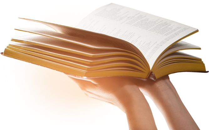 a person holding a book in their hand