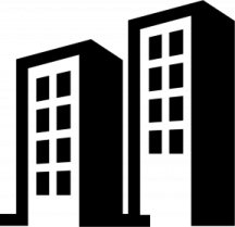 a black and white image of two tall buildings