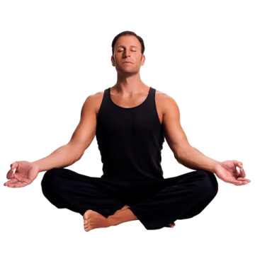 a man sitting in the middle of a yoga pose