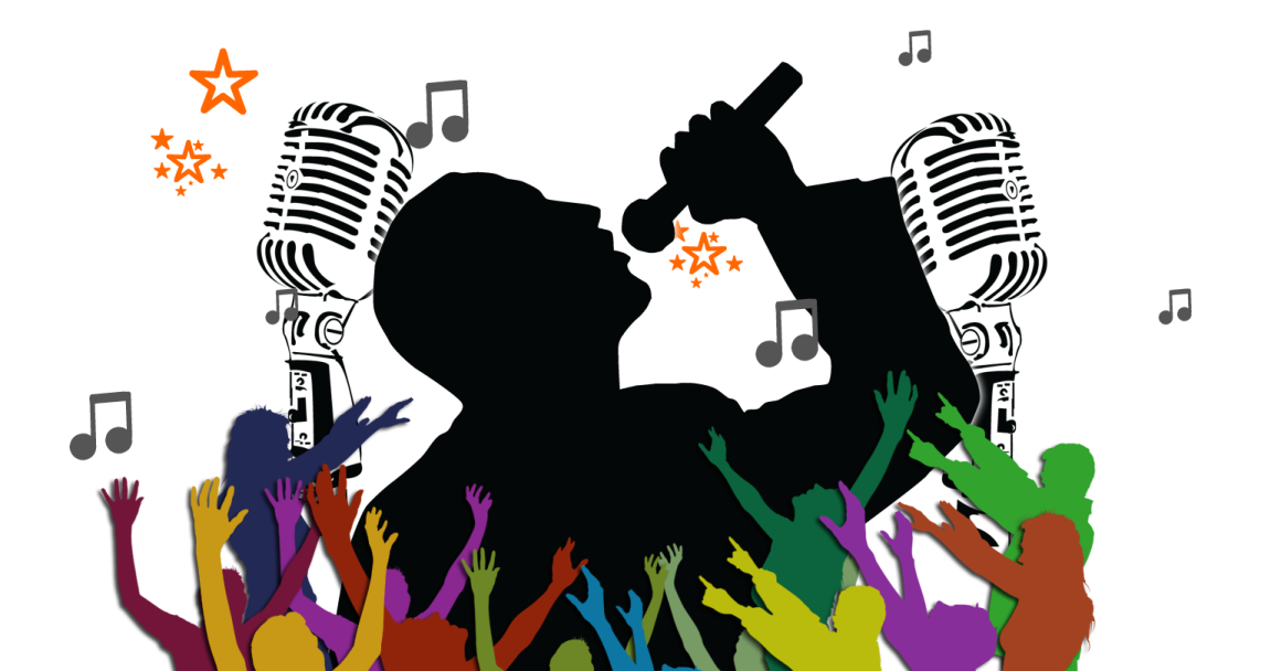 a crowd of people with their hands up in the air