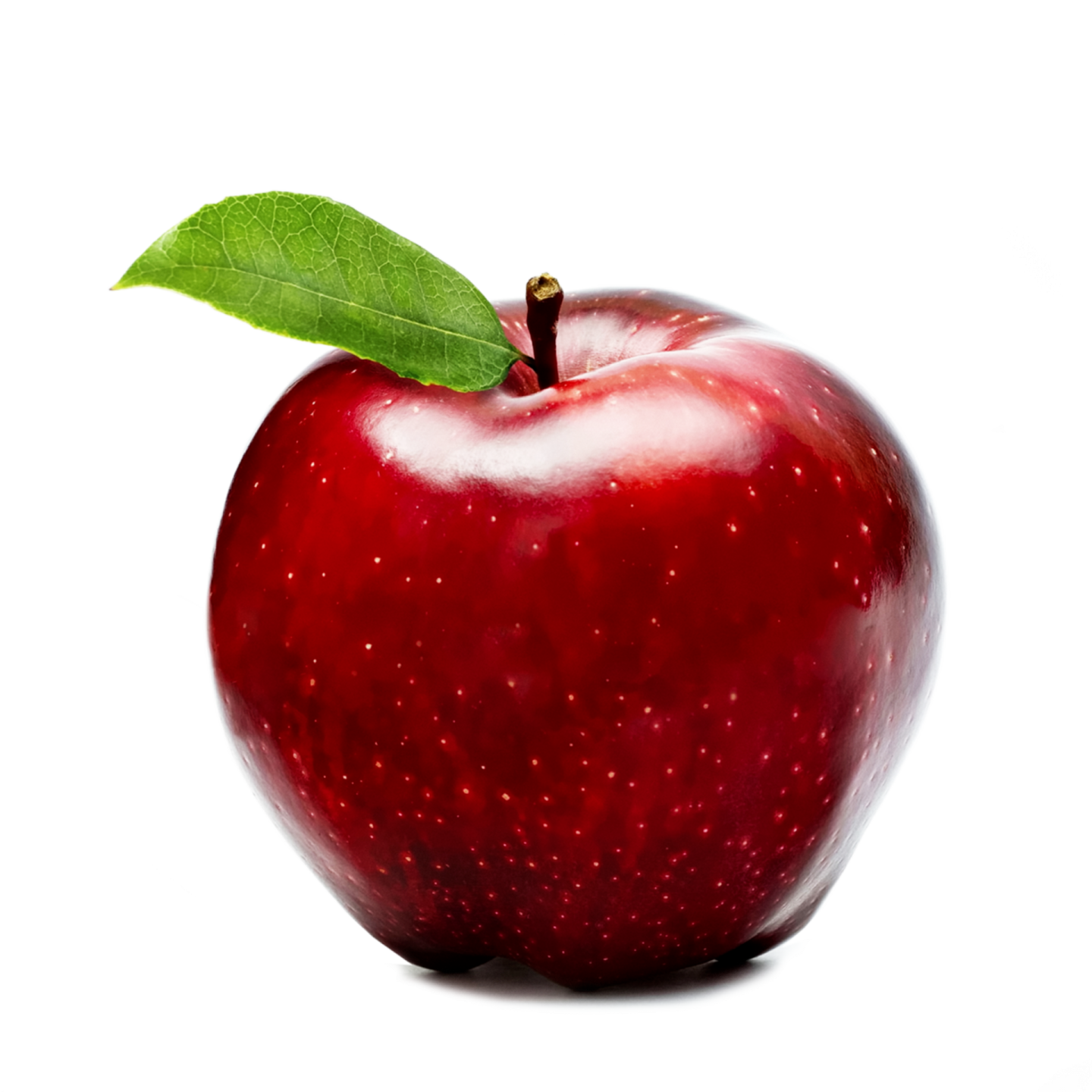 an apple with a leaf on top of it