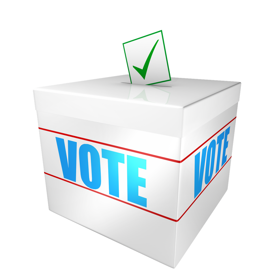 a voting box with the word vote on it