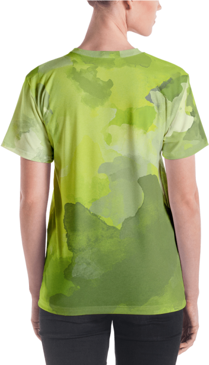 a woman wearing a green t - shirt