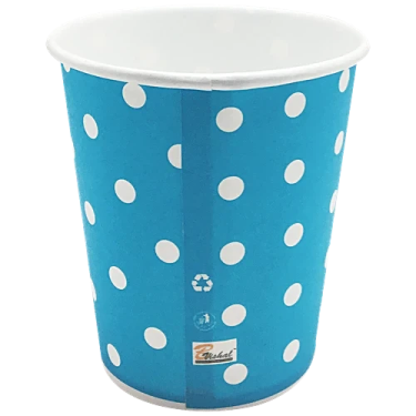 a blue cup with white polka dots on it