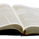 an open book on a white background