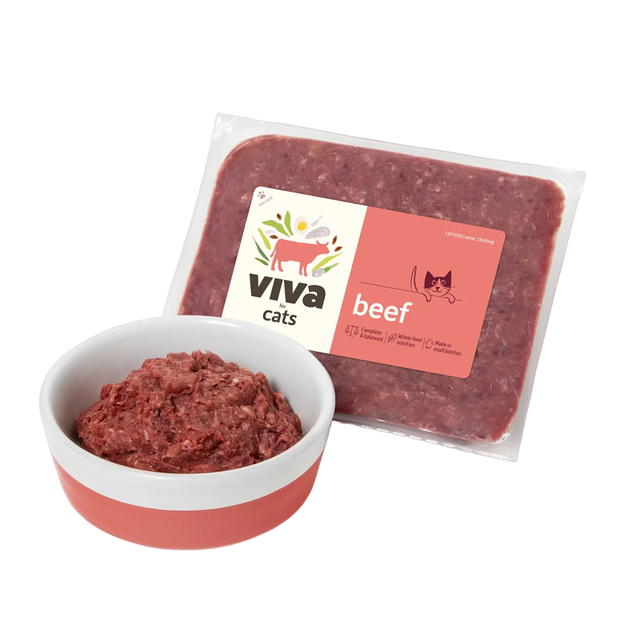 a white bowl filled with beef meat next to a bag of beef