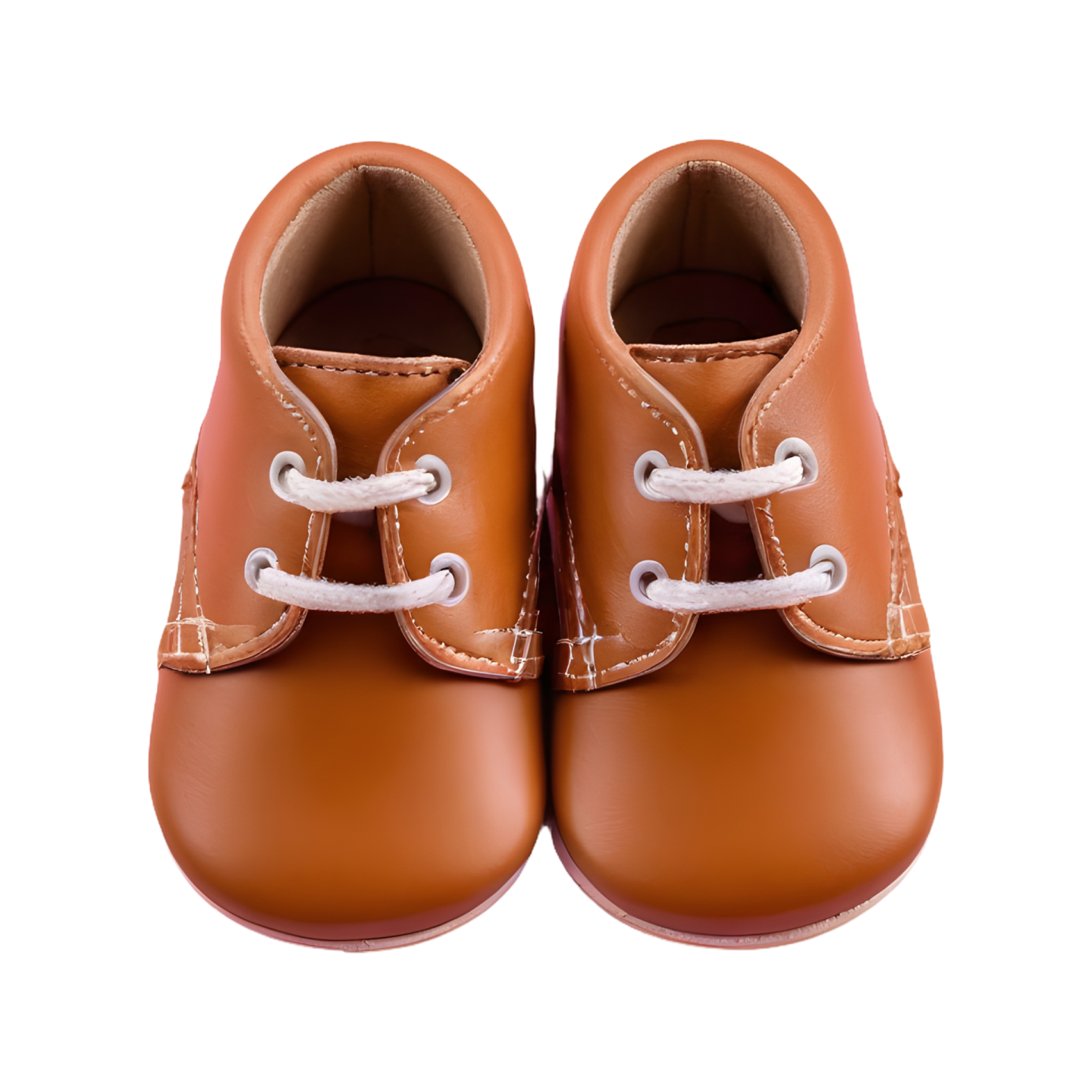 a pair of baby shoes on a white background