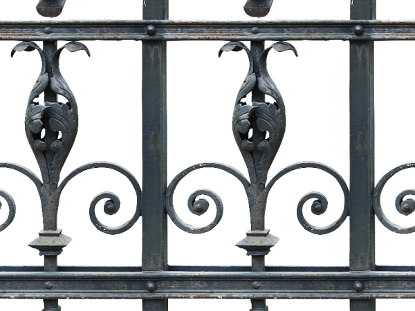 an iron fence with a bird on it