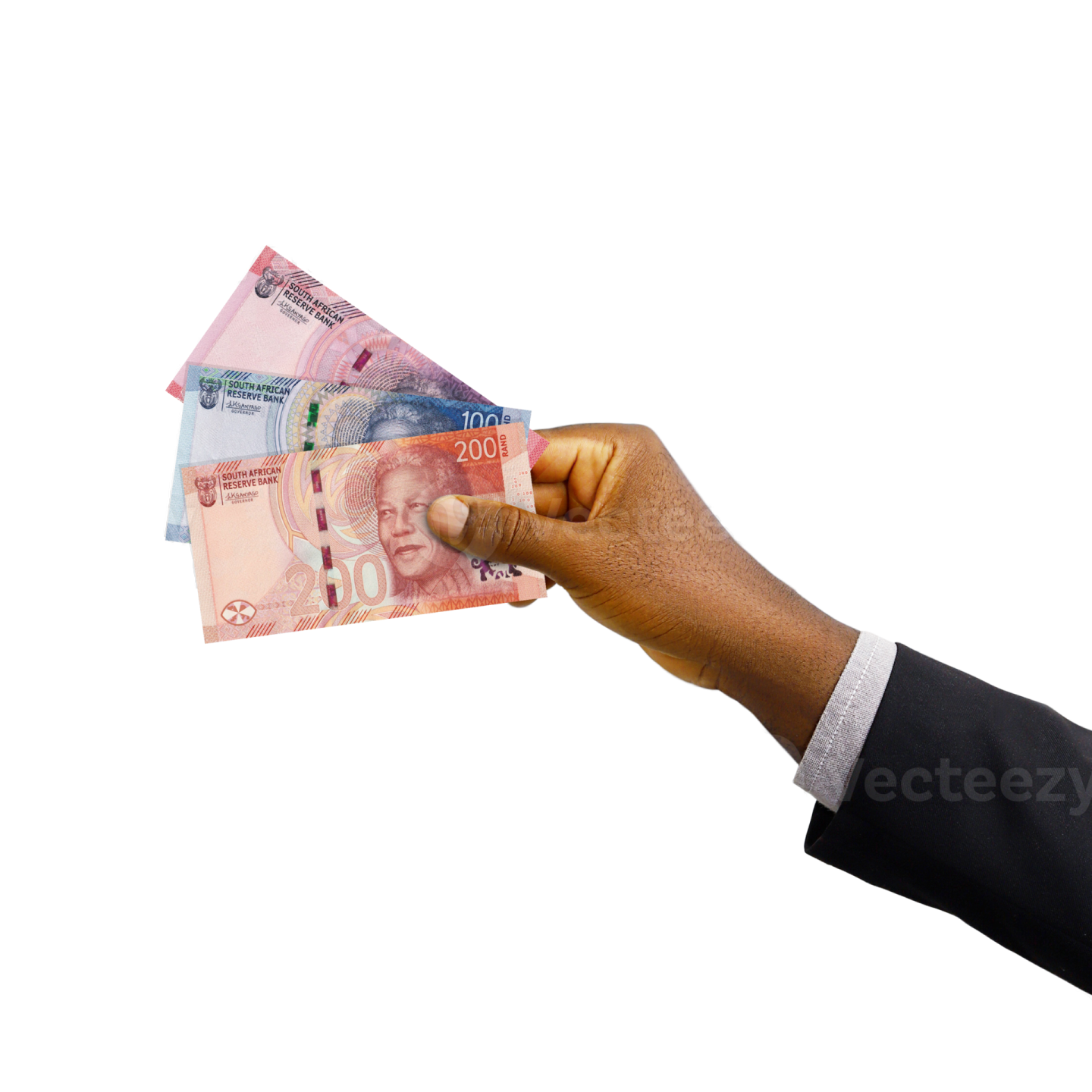 a hand holding several different bank notes