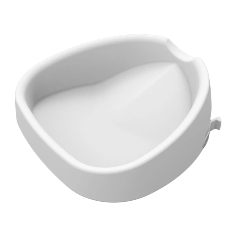a white bowl with a handle on it
