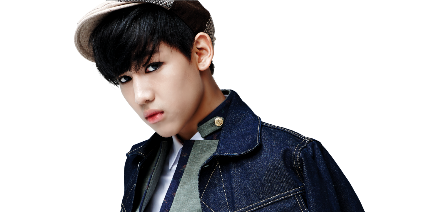 a young man in a denim jacket and hat