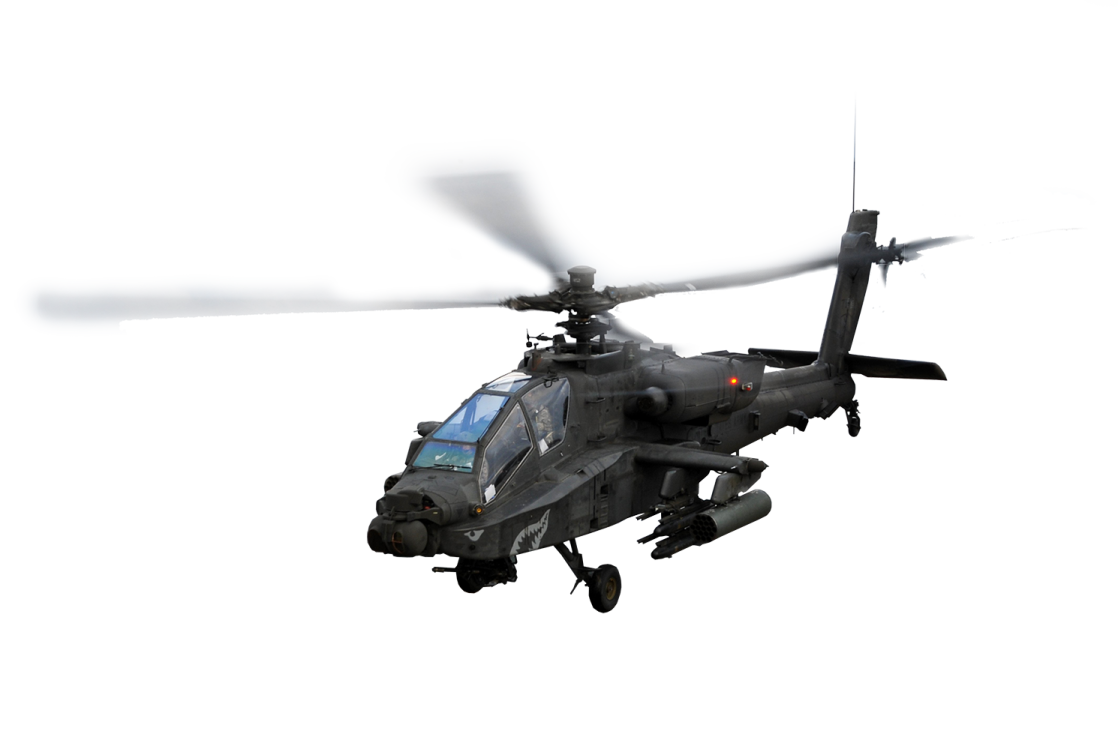 a military helicopter flying in the sky
