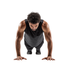a man in a black tank top doing push ups