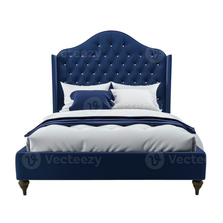 a bed with blue velvet headboard and white pillows