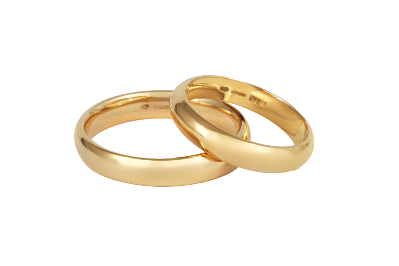 a pair of gold wedding rings