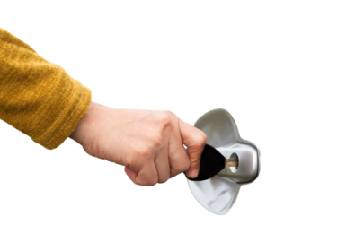 a person holding a metal object in their hand
