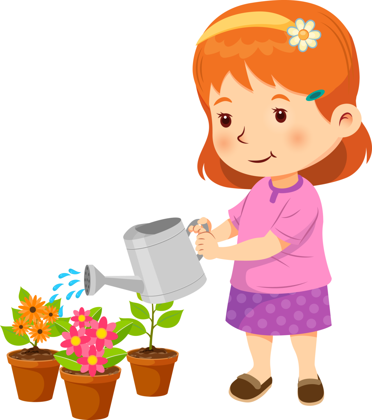 a little girl watering flowers