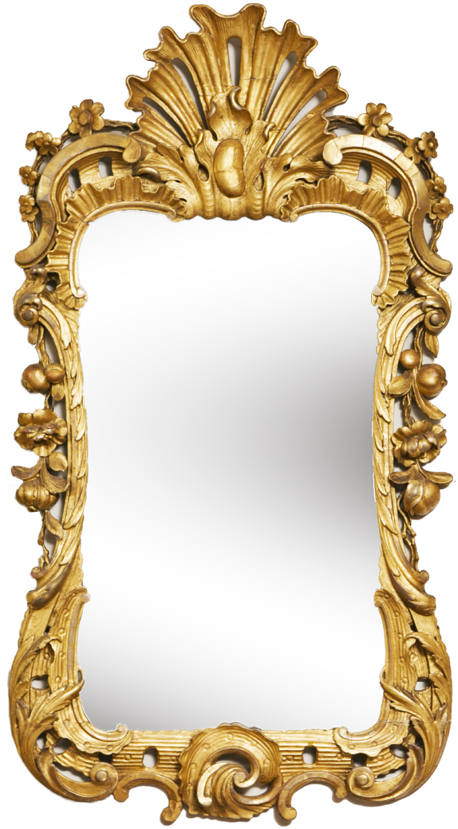 an ornate gold framed mirror