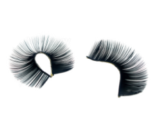 a pair of eyelashes on white background