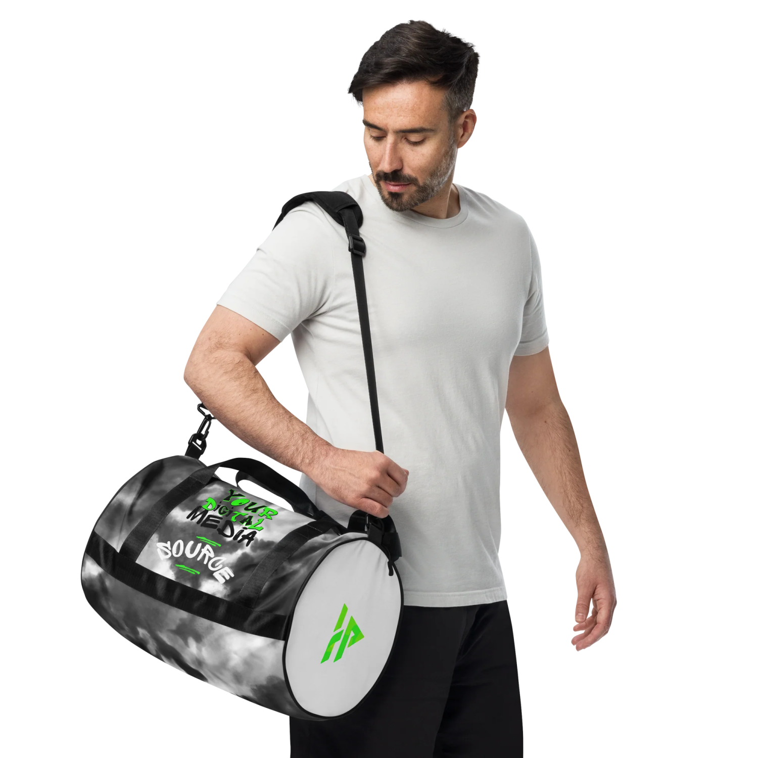 a man carrying a duff bag