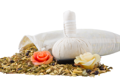 a bag of tea next to some flowers