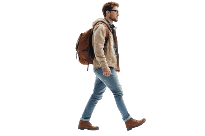 a man walking with a backpack on his back