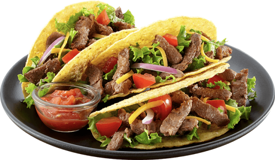 a plate of beef tacos with tomatoes and onions