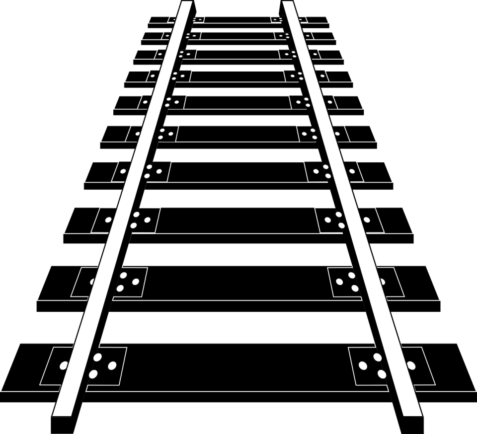 a black and white image of a train track