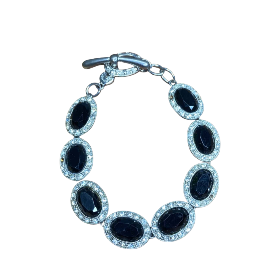 a bracelet with black and white stones