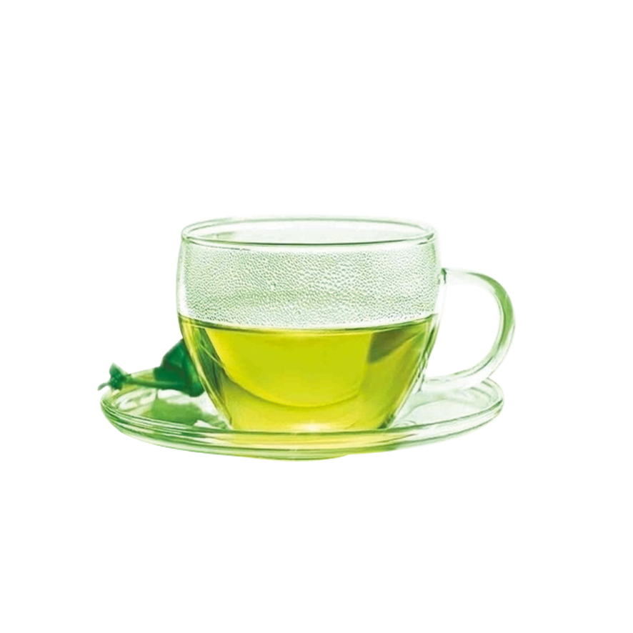 a glass cup filled with green tea