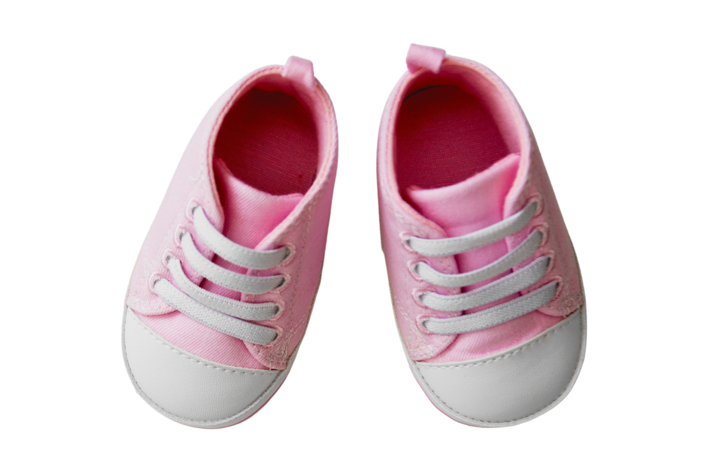 a pair of pink shoes on a white background