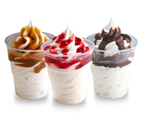 three desserts in plastic cups on a white background