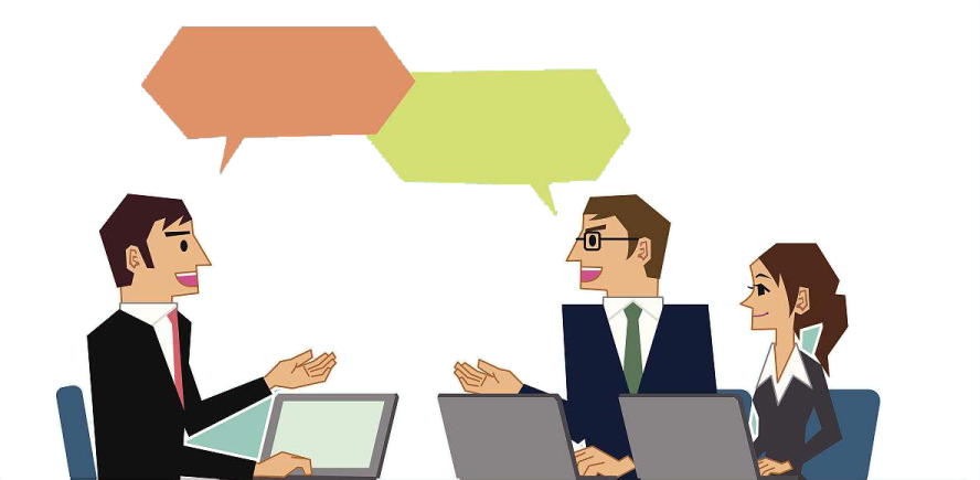 two people sitting at a table with laptops and talking