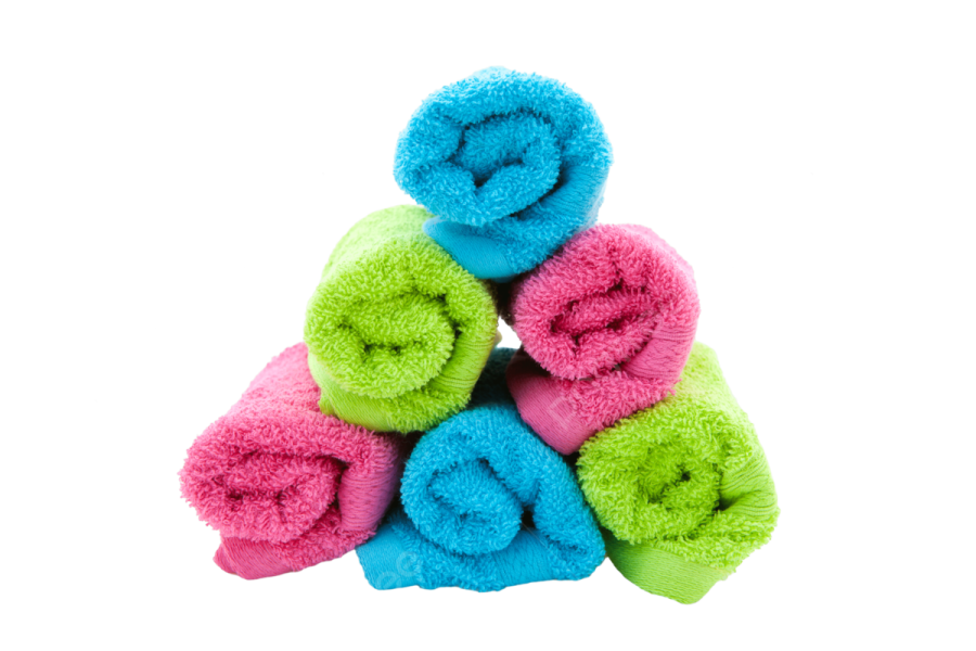 a pile of colorful towels on a white background