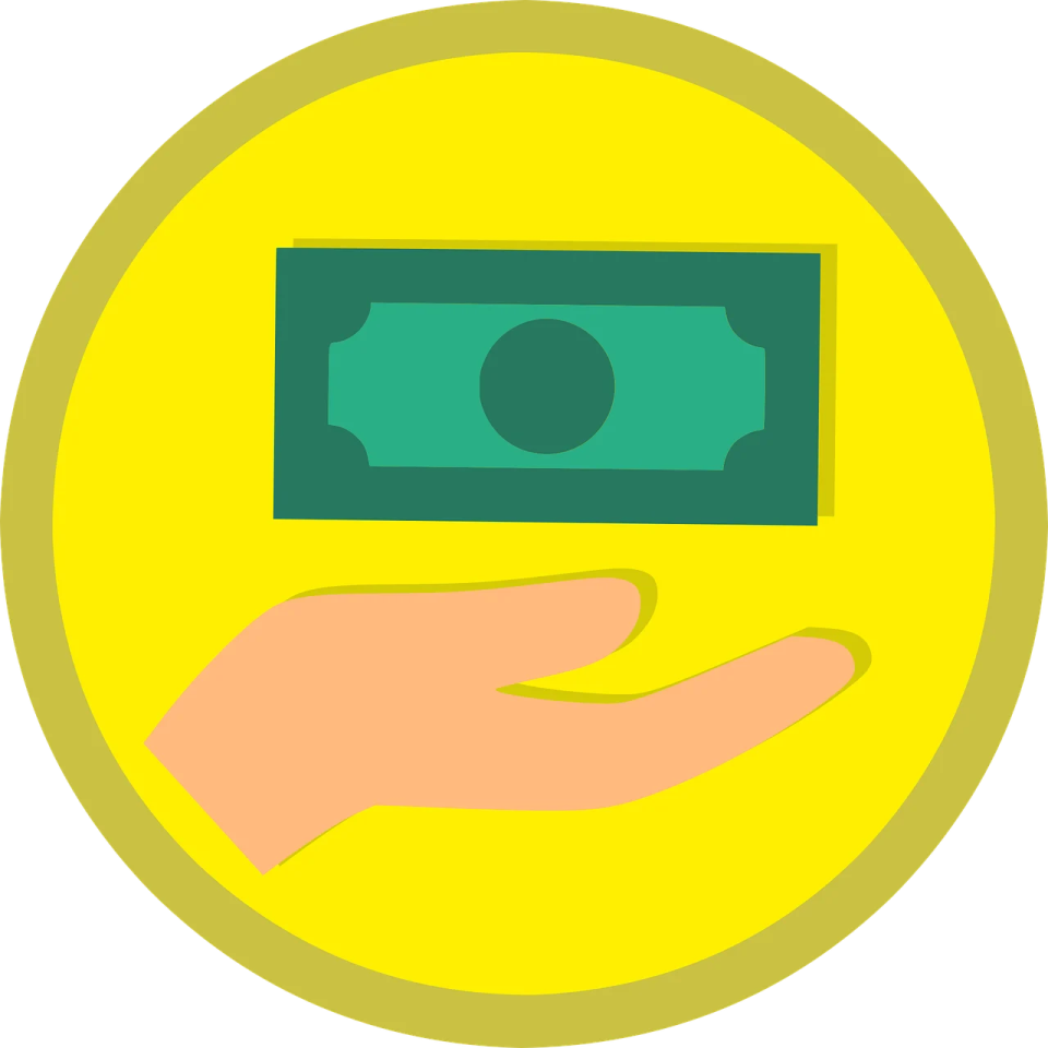 a hand holding a money bill