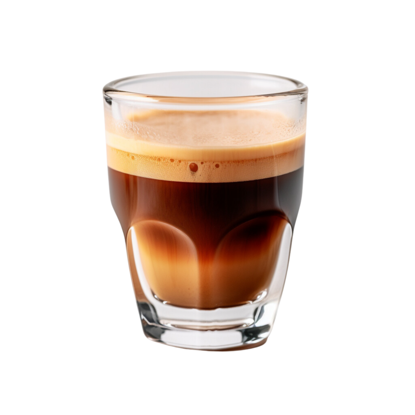 a glass filled with coffee sitting on top of a table