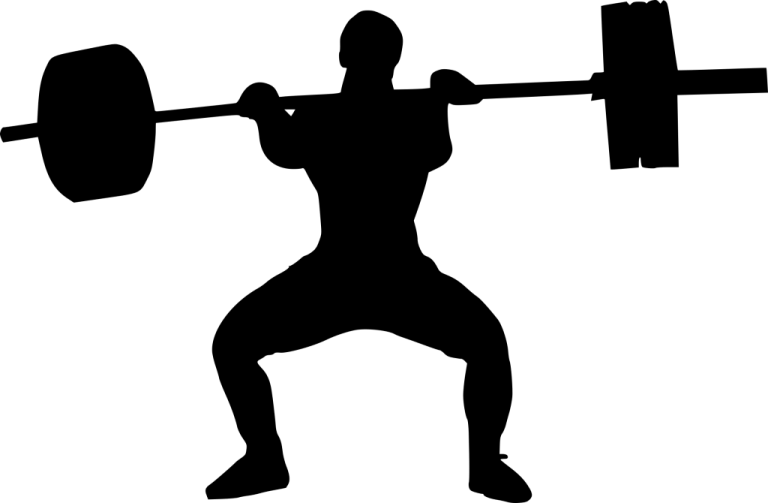 a silhouette of a man lifting a barbell