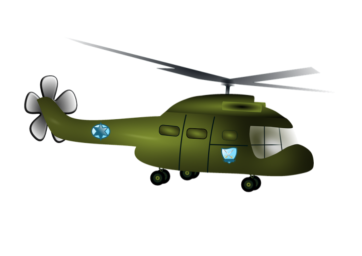 a green helicopter is flying in the air