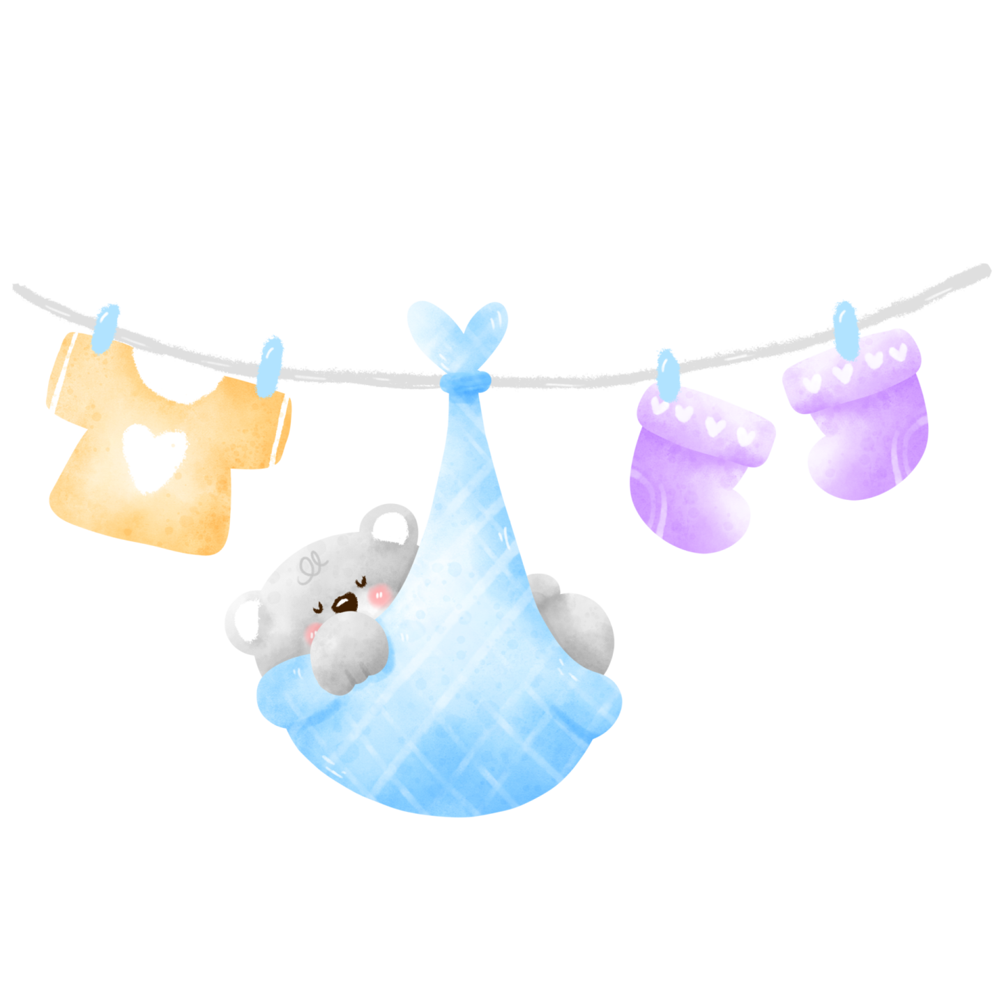 a baby boy's clothes hanging on a line