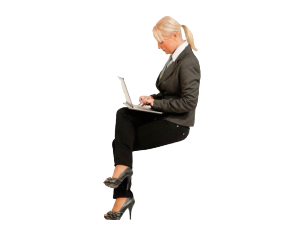 a woman sitting on the floor using her laptop