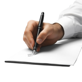 a person writing on a piece of paper with a pen